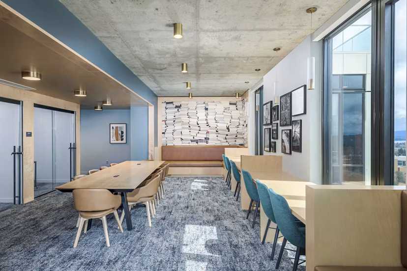 Cozy clubhouse study area with modern furnishings at The Accolade Apartments, ideal for student gatherings and collaborative learning spaces