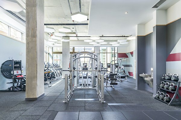 State-of-the-art fitness center featuring modern equipment at The Accolade Apartments
