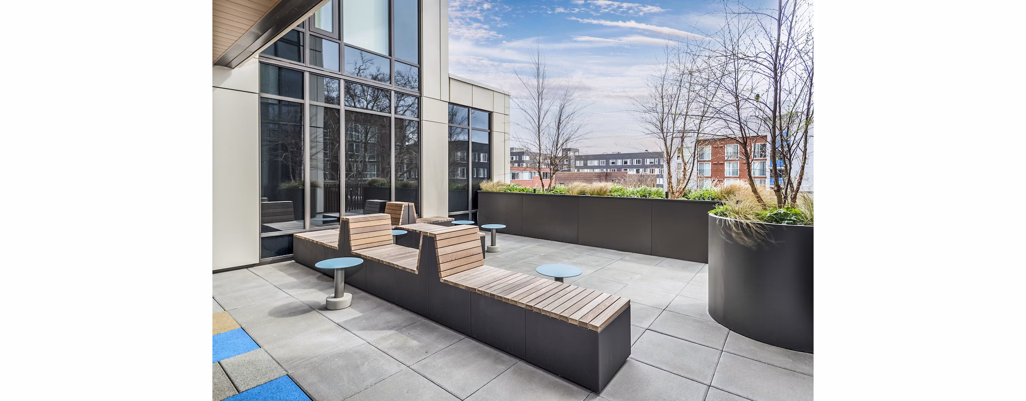 Spacious patio with modern furnishings at The Accolade Apartments, perfect for relaxing and enjoying outdoor views