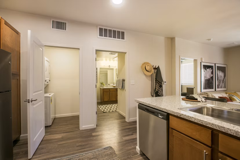 Modern kitchen with stainless steel appliances in South Meadows Apartments