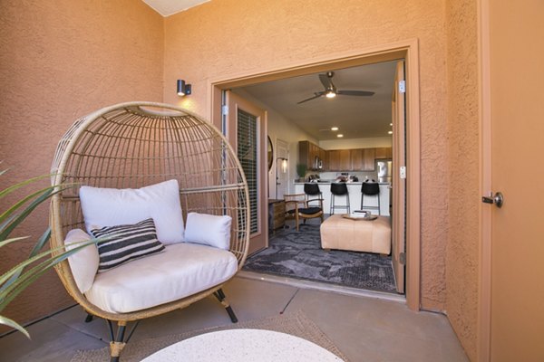 South Meadows Apartments: Cozy patio with seating and plants for relaxation
