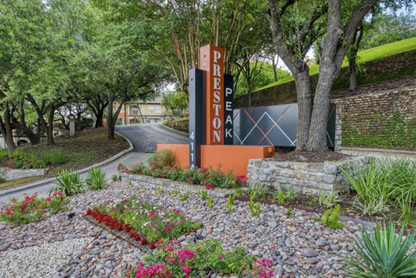 Preston Peak Apartments: Elegant signage in modern apartment complex