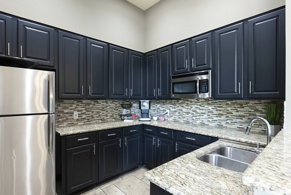 Clubhouse featuring modern design and comfortable seating at Preston Peak Apartments