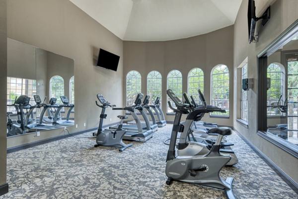 fitness center at Preston Peak Apartments