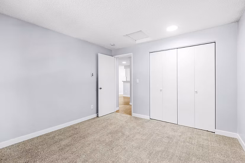 Cozy bedroom featuring modern furnishings at Avana West Hill Apartments, a Greystar luxury property in vibrant West Hill neighborhood