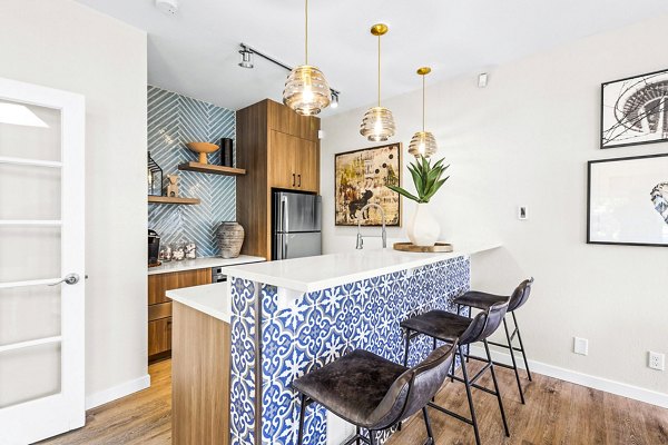 Clubhouse at Avana West Hill: Stylish meeting area with modern decor and comfortable seating options, perfect for community gatherings and events