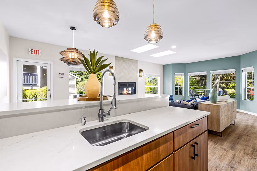 Stylish clubhouse with modern interiors at Avana West Hill Apartments, featuring cozy seating and contemporary design for social gatherings