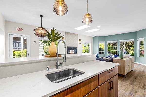 Stylish clubhouse with modern interiors at Avana West Hill Apartments, featuring cozy seating and contemporary design for social gatherings