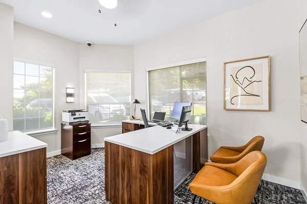 Clubhouse with modern design elements at Avana West Hill Apartments leasing office