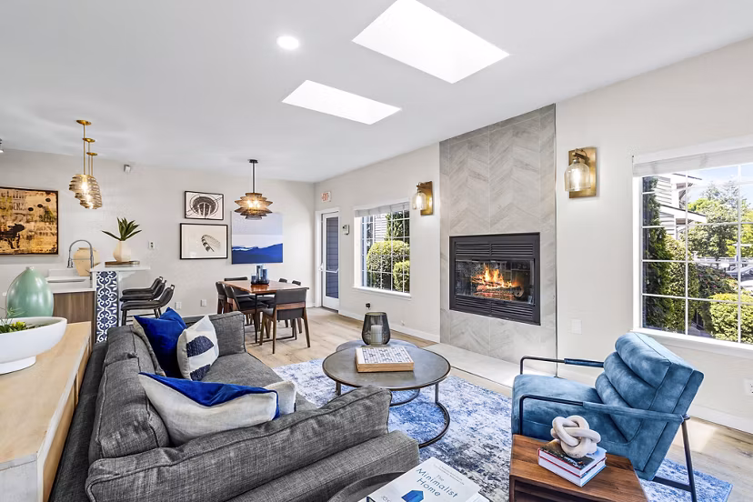 Clubhouse featuring stylish lounge seating and community kitchen at Avana West Hill Apartments