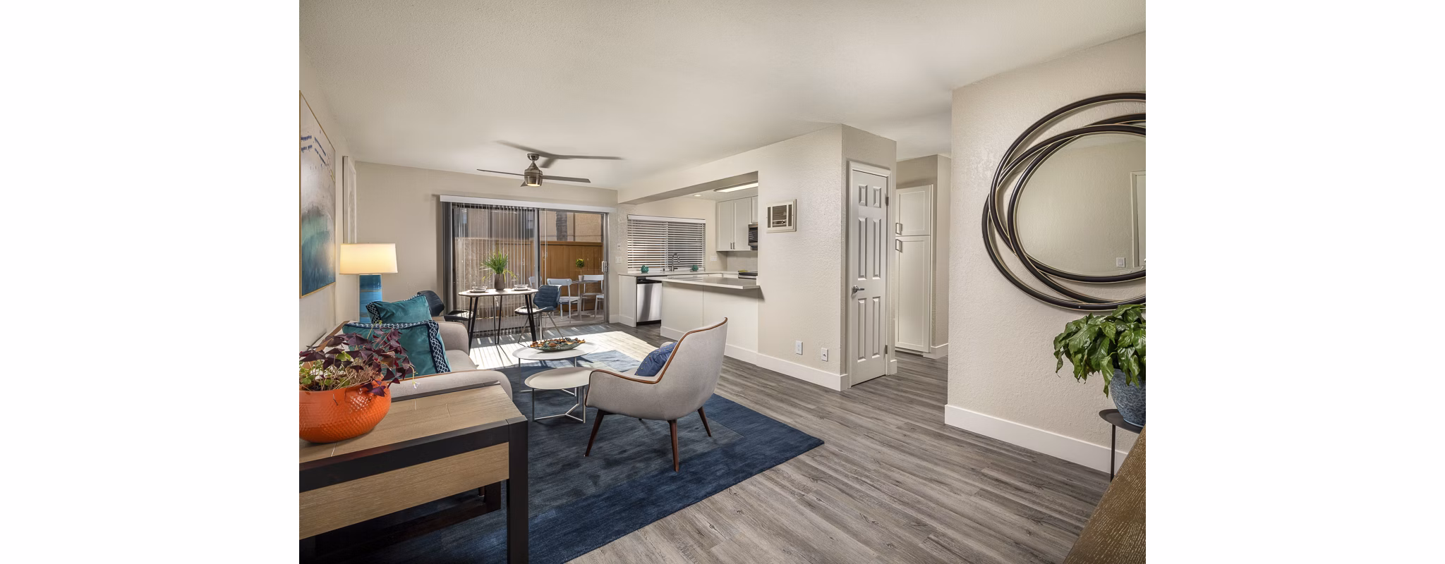 Spacious living room with modern decor at Stone Arbor Apartments, featuring luxury amenities and large windows
