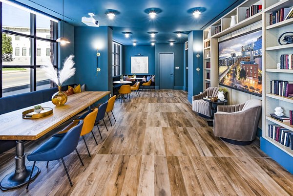 Luxurious clubhouse with modern furnishings at Harlowe Apartments: a premium Greystar community offering upscale amenities and social spaces