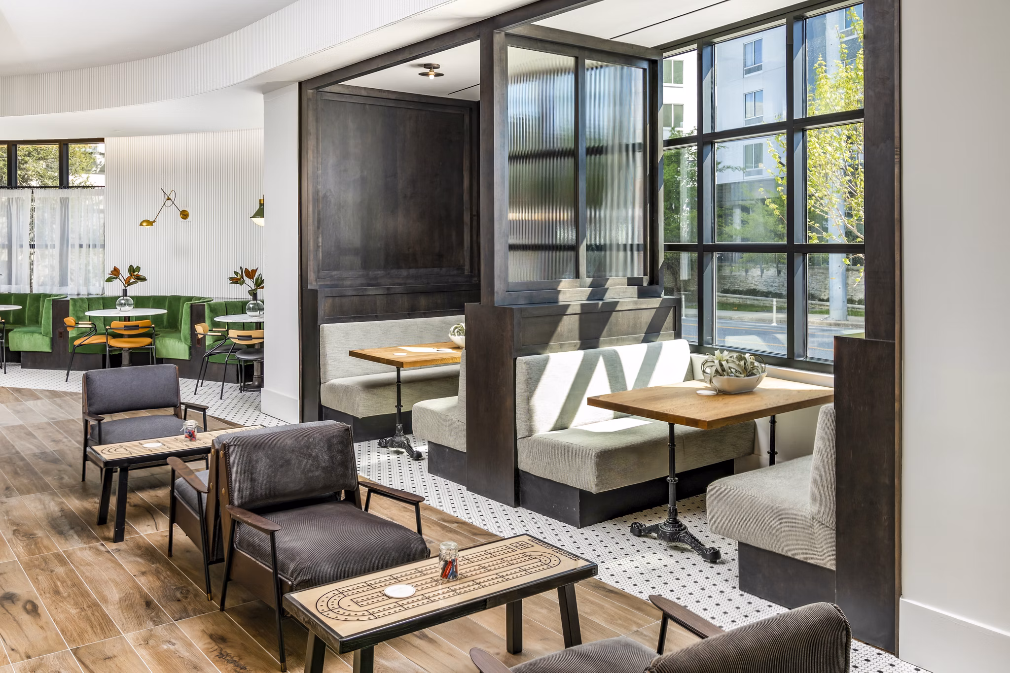 Clubhouse with modern design and comfortable seating at Harlowe Apartments, a luxury Greystar property