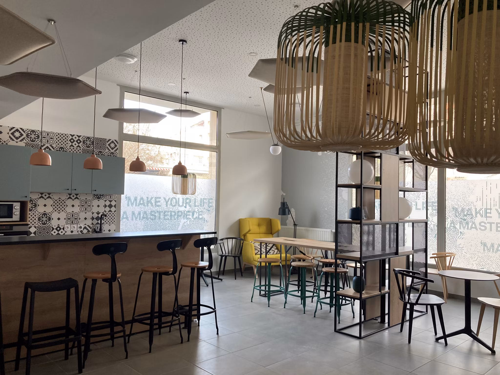 Contemporary common area with stylish furniture, modern decor, and natural lighting creating a relaxing environment.