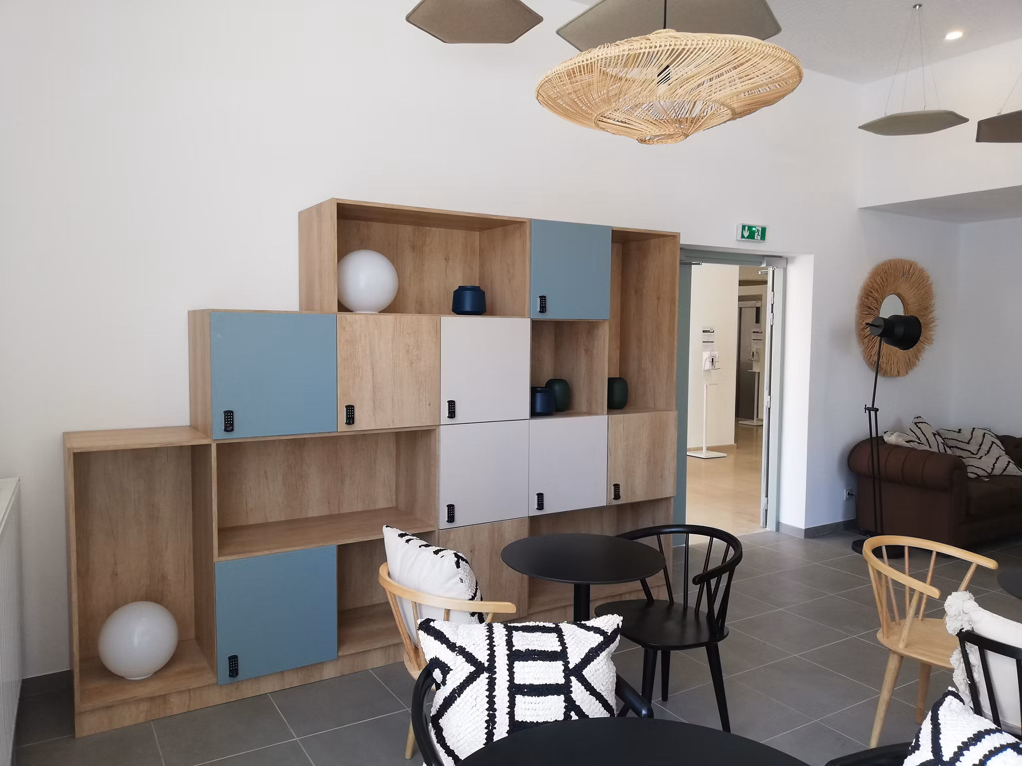 Open-concept living and dining area featuring contemporary furniture, modern lighting, and a stylish interior design.