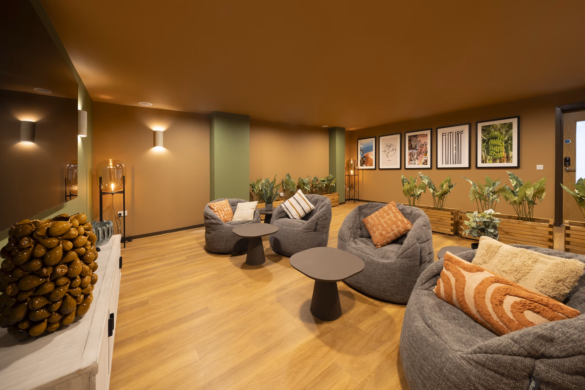 Stylish cinema room at Canvas Glasgow with cozy seating, warm lighting, and a contemporary decor.