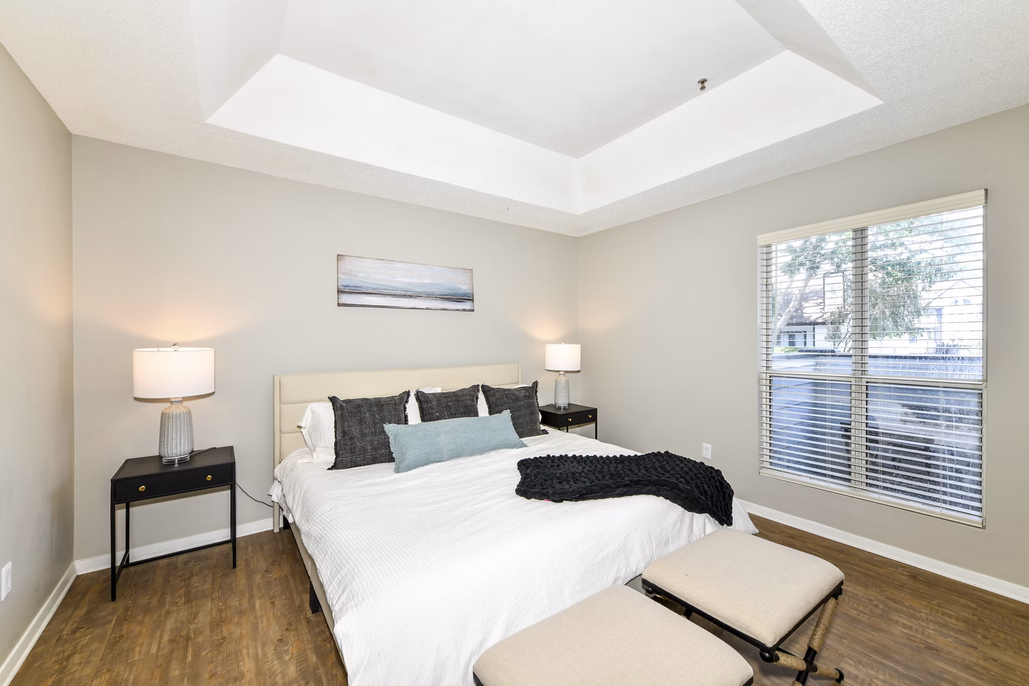 Bedroom featuring cozy decor and natural light at Avana Dunwoody Apartments