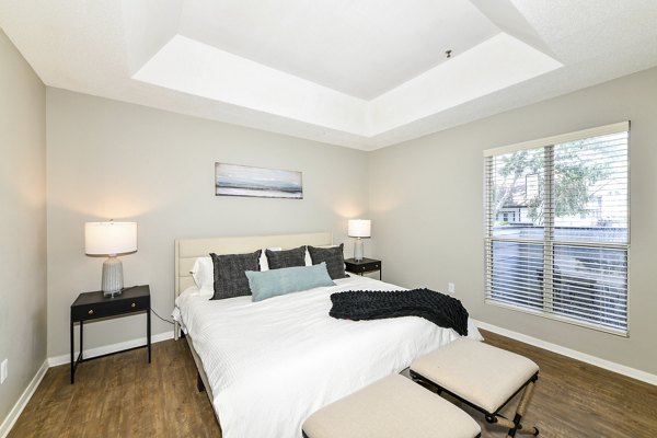Bedroom featuring cozy decor and natural light at Avana Dunwoody Apartments
