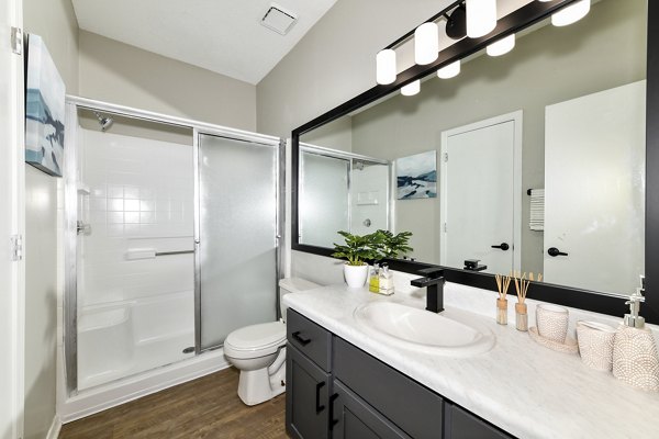 Stylish bathroom with modern fixtures at Avana Dunwoody Apartments