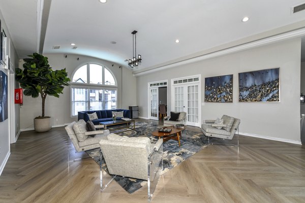 Modern clubhouse with stylish seating and entertainment area at Avana Dunwoody Apartments