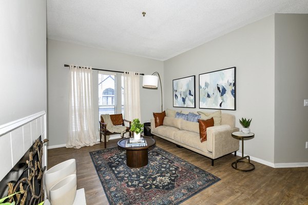 Spacious living room with stylish decor at Avana Dunwoody Apartments