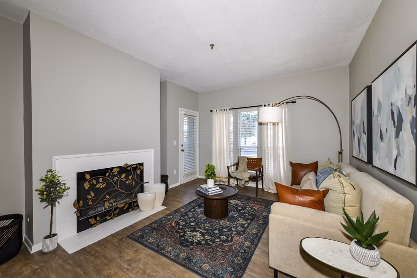 Spacious living room with modern decor in Avana Dunwoody Apartments