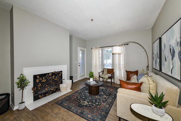 Spacious living room with modern decor in Avana Dunwoody Apartments