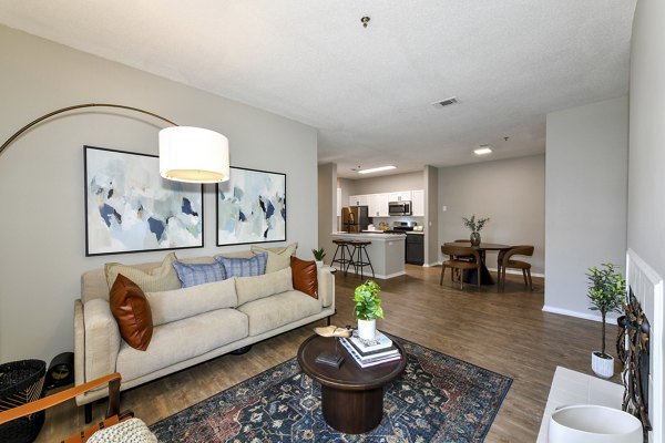 Spacious living room with modern decor in Avana Dunwoody Apartments