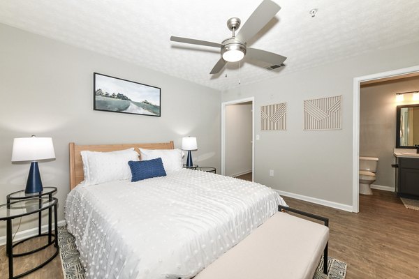 Cozy bedroom with modern decor at Avana Twenty9 Apartments