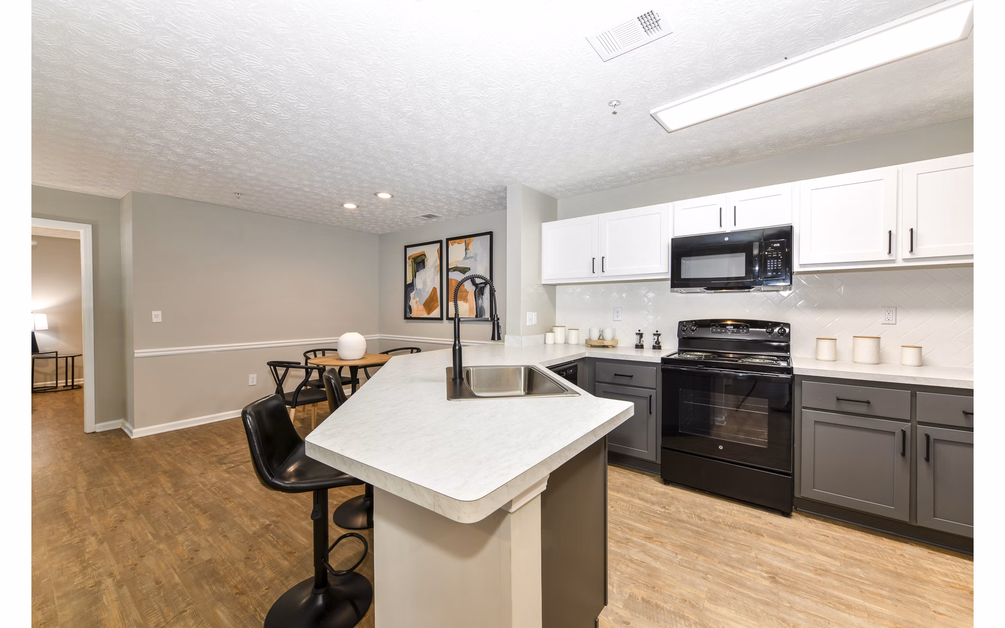 Modern kitchen featuring stainless steel appliances at Avana Twenty9 Apartments