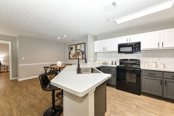 Modern kitchen featuring stainless steel appliances at Avana Twenty9 Apartments