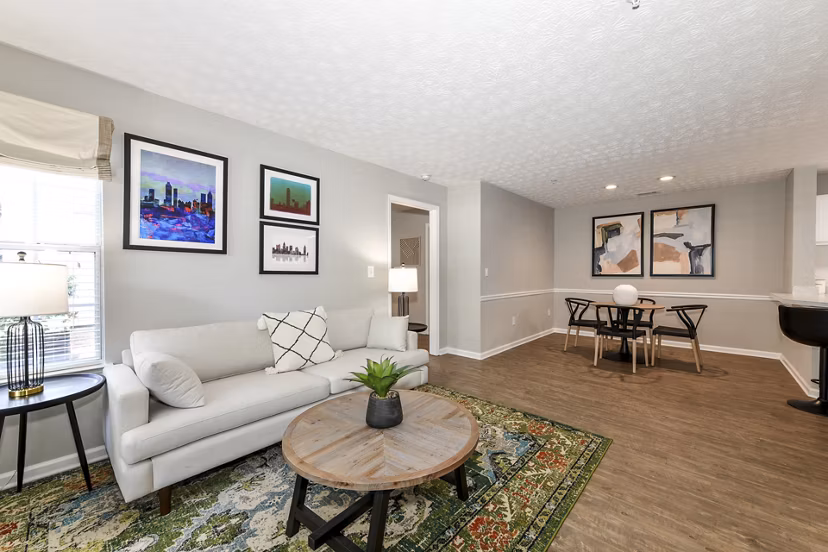 Spacious living room with modern decor in Avana Twenty9 Apartments