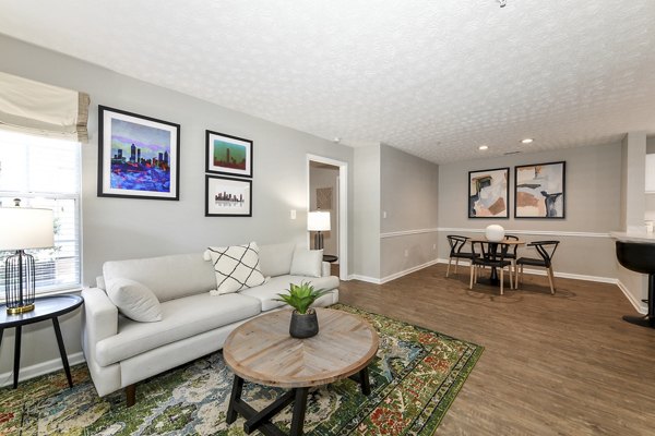 Spacious living room with modern decor in Avana Twenty9 Apartments