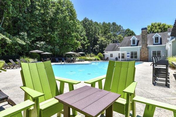Relaxing pool area with sun loungers at Avana Twenty9 Apartments luxury apartments