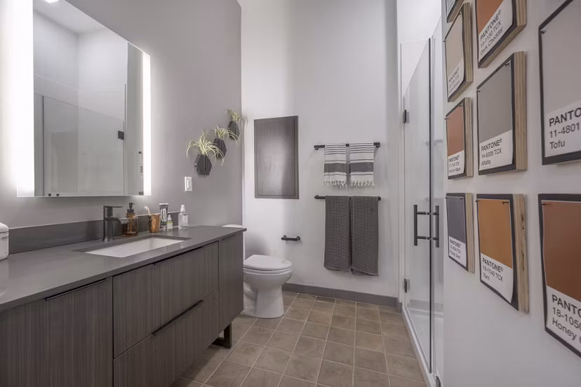 Modern bathroom featuring elegant fixtures at Addison Apartments