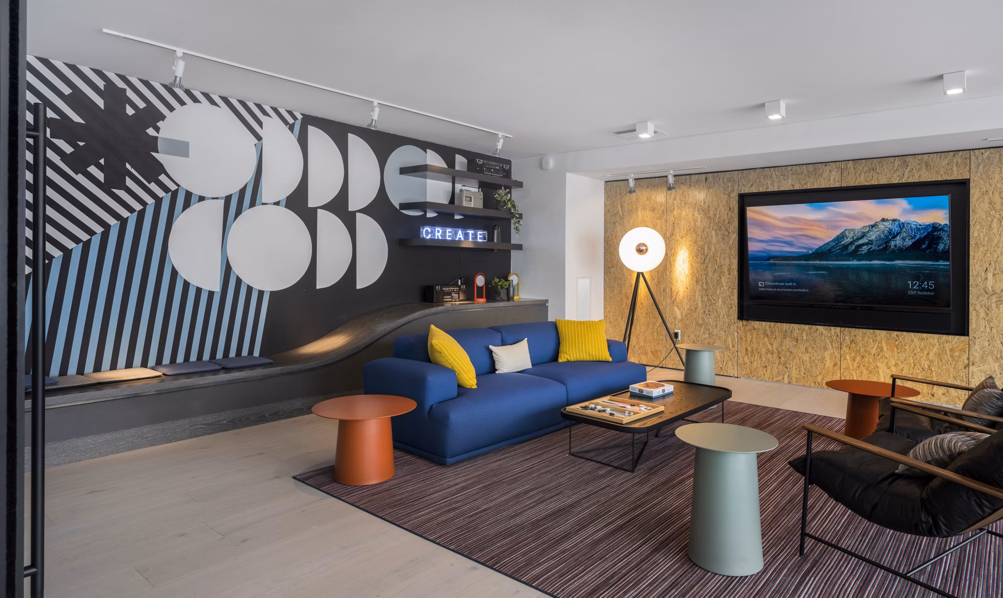 Stylish clubhouse with modern seating at Addison Apartments, ideal for social gatherings and events