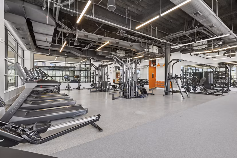 Modern fitness center at Addison Apartments featuring state-of-the-art equipment for active lifestyles