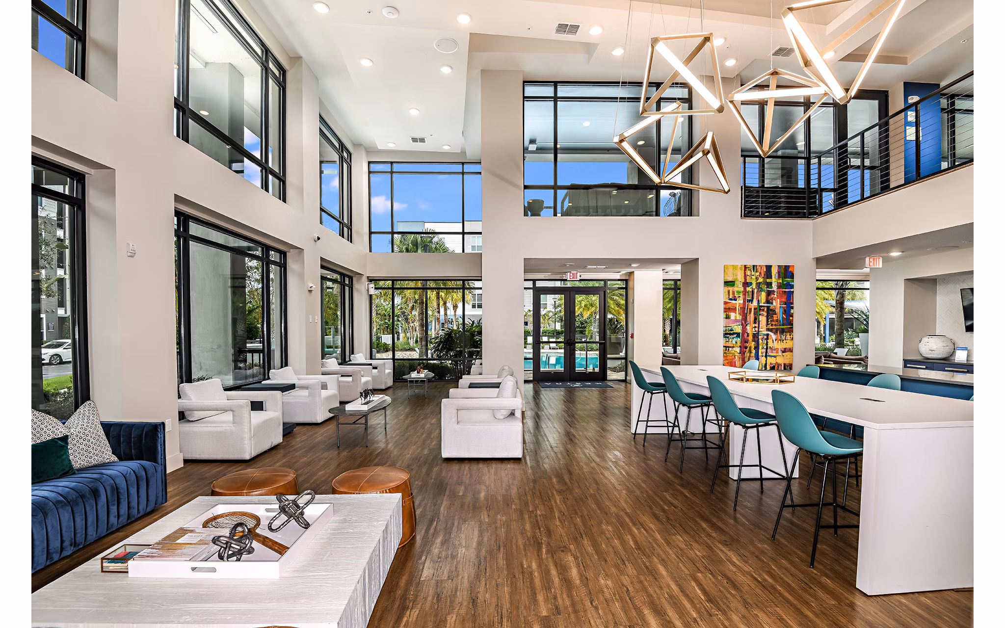 Kestra Apartments: Modern clubhouse with stylish seating and entertainment areas in luxury apartment community