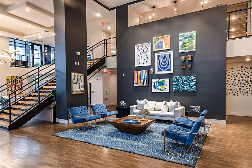 Modern clubhouse with sleek design at Kestra Apartments, showcasing luxury amenities for residents' social gatherings