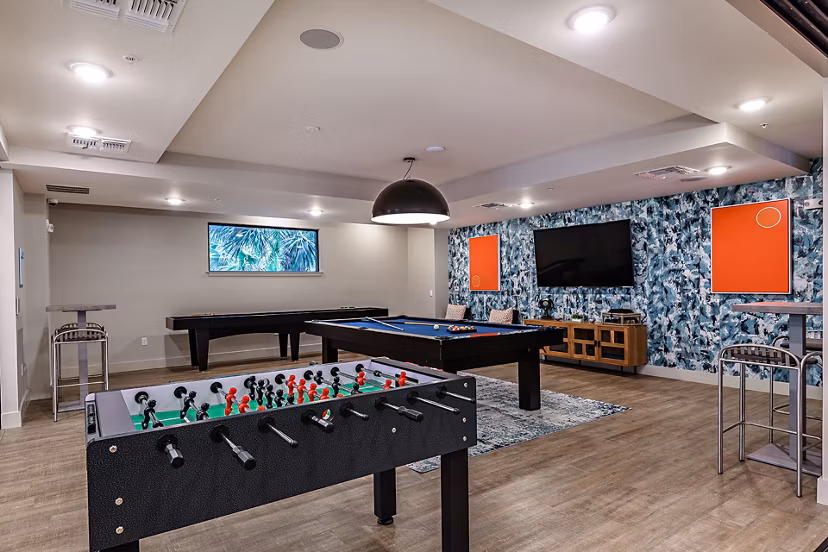 Clubhouse featuring modern decor and seating areas at Kestra Apartments
