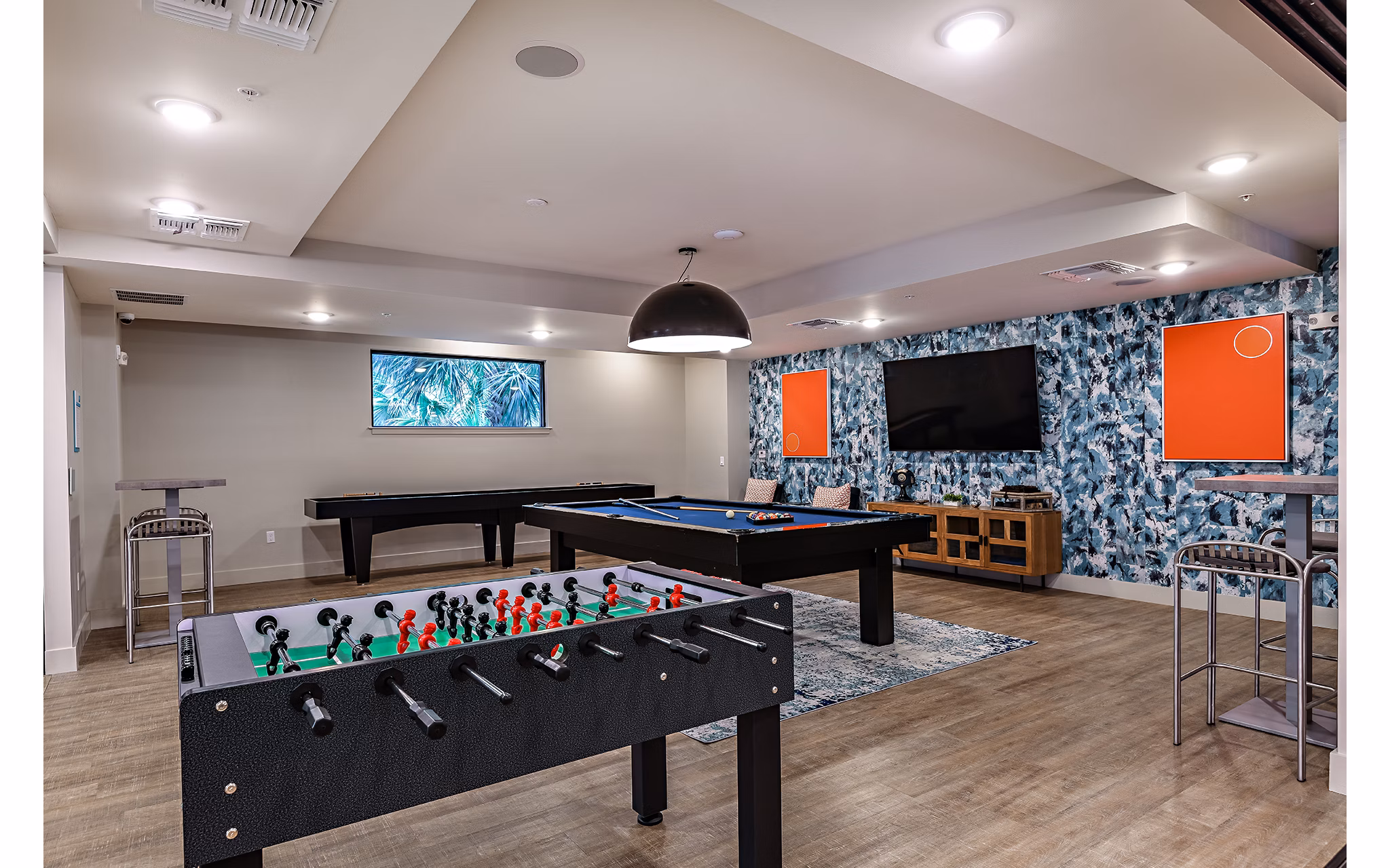 Clubhouse featuring modern decor and seating areas at Kestra Apartments