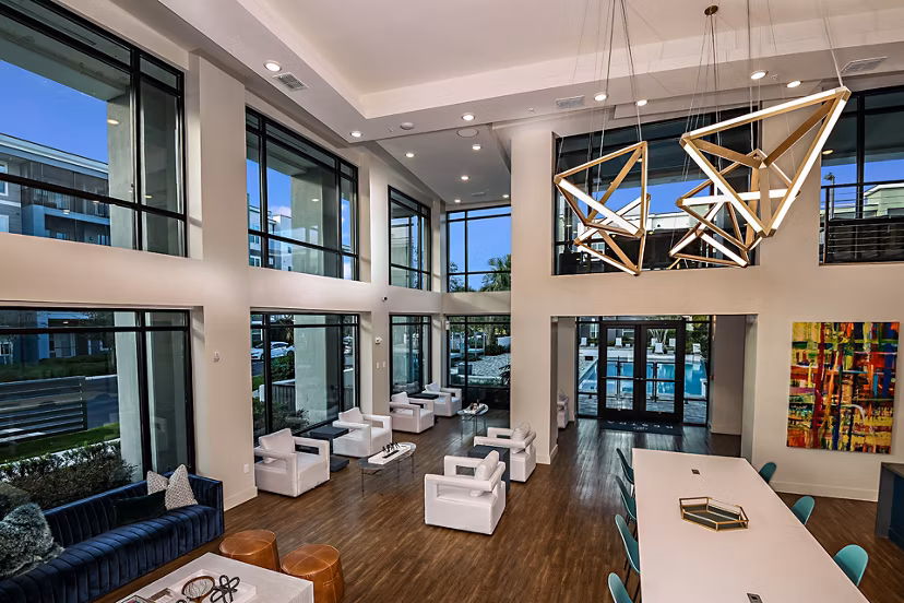 Clubhouse featuring modern lounge areas and entertainment spaces at Kestra Apartments in a luxury Greystar community