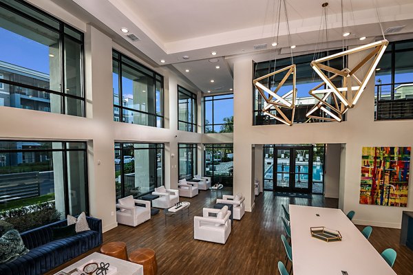 Clubhouse featuring modern lounge areas and entertainment spaces at Kestra Apartments in a luxury Greystar community