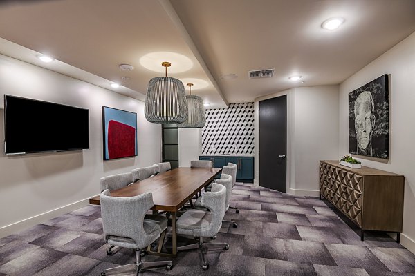 Clubhouse featuring modern design and spacious seating areas at Kestra Apartments