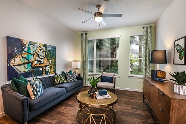 Elegant living room with modern furnishings at Kestra Apartments