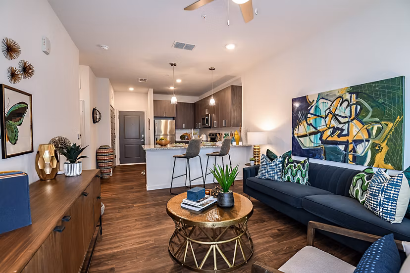 Spacious living room with stylish decor at Kestra Apartments in a vibrant community
