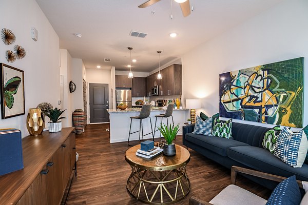 Spacious living room with stylish decor at Kestra Apartments in a vibrant community
