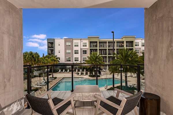 Sleek pool area with modern lounge chairs at Kestra Apartments offering luxury outdoor relaxation