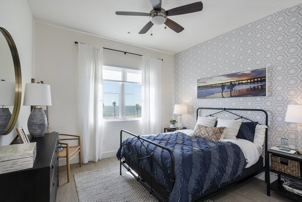 Spacious bedroom with modern decor at Coastline Ventura Apartments