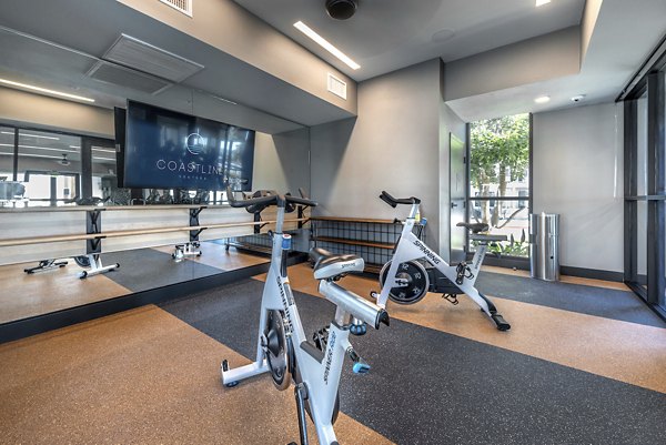 Modern fitness center with state-of-the-art equipment at Coastline Ventura Apartments
